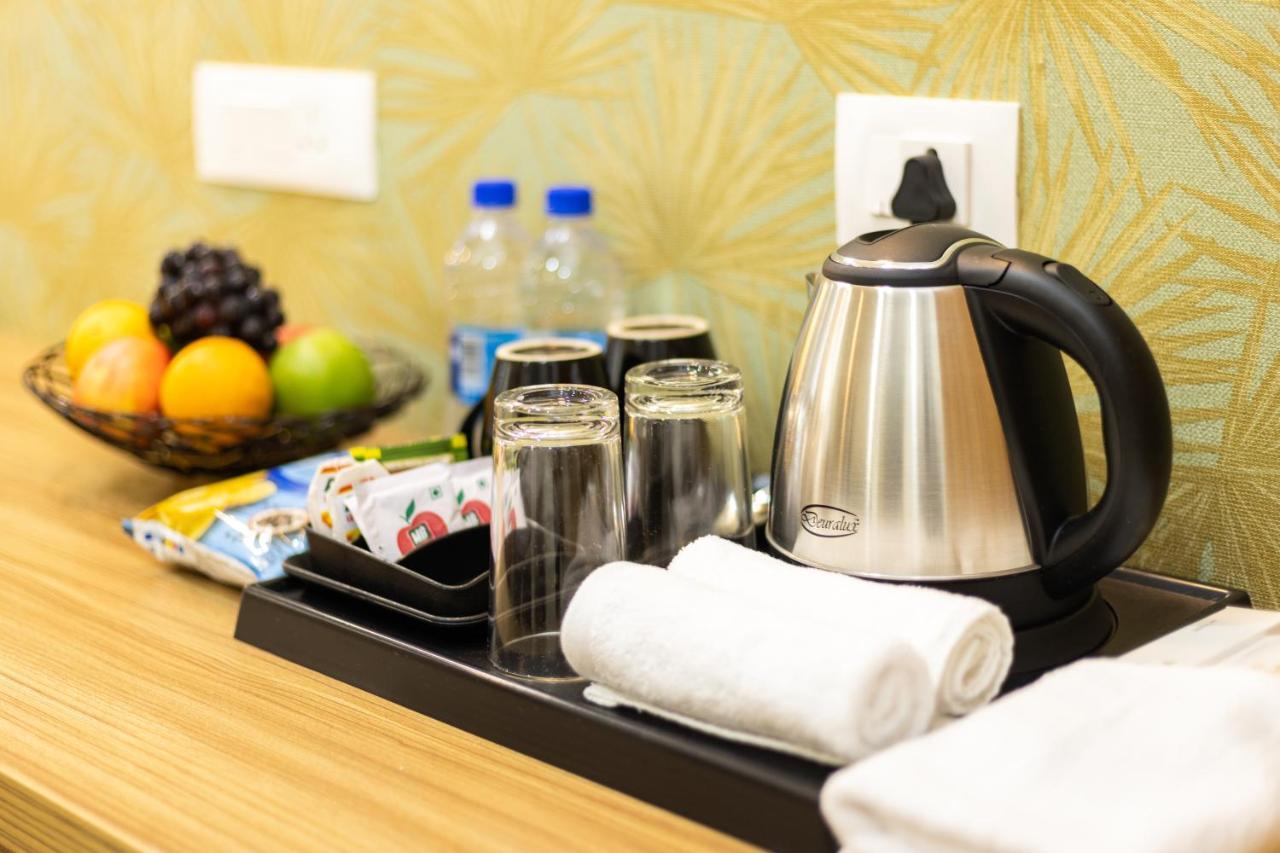 Esaa Airport Hotel Kochi Esterno foto